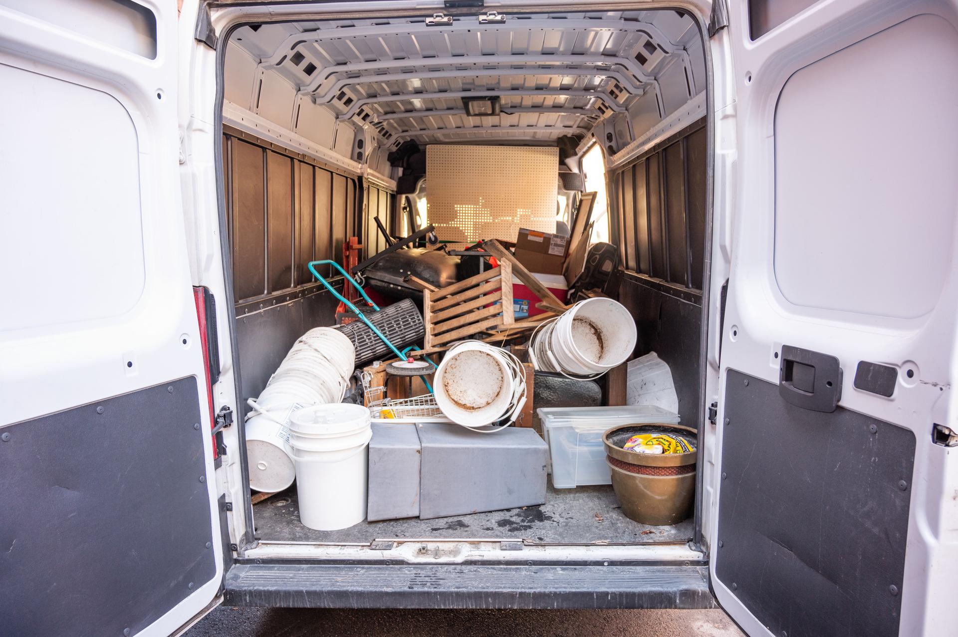 Back of cargo van full of stuff