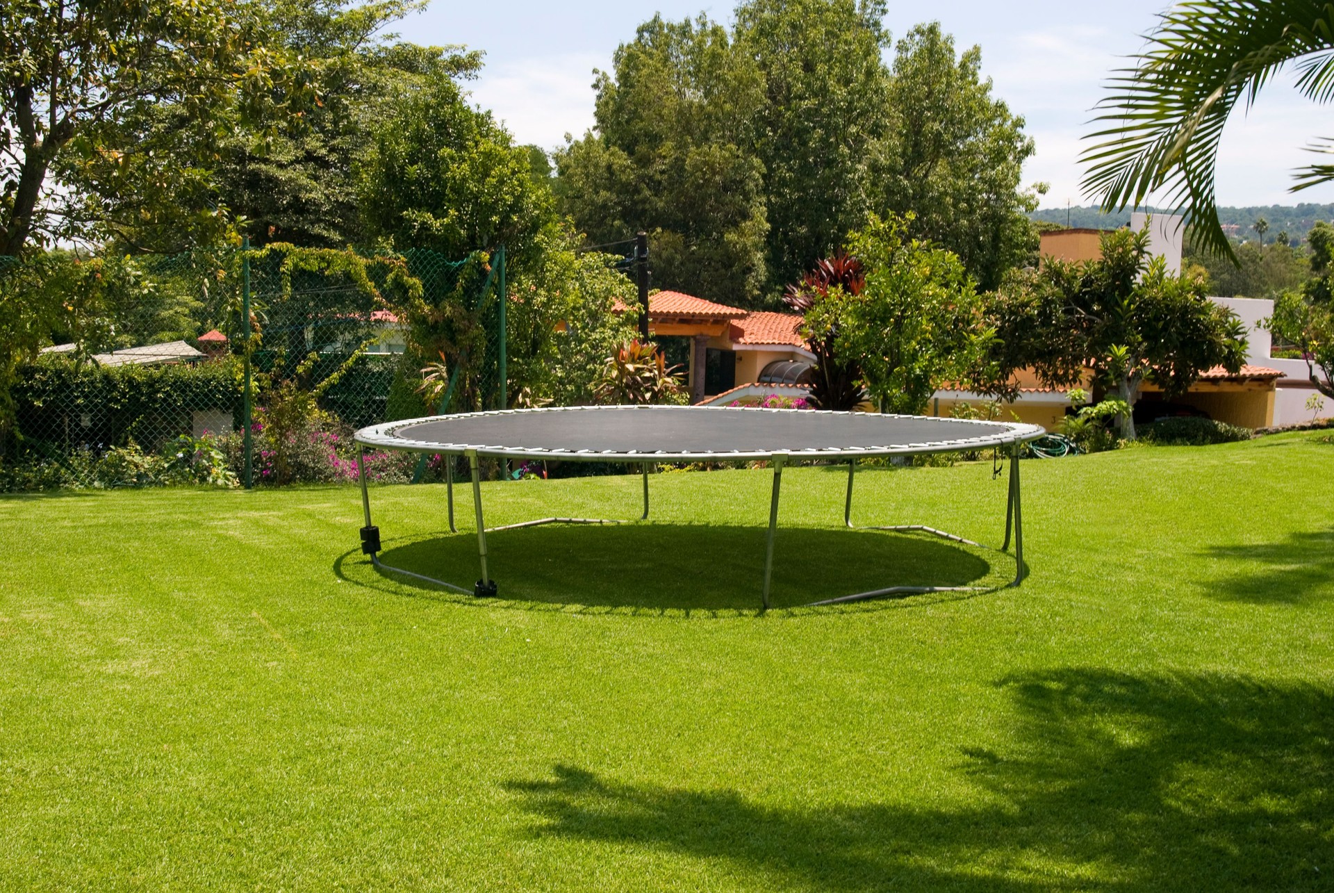 Trampoline in a garden
