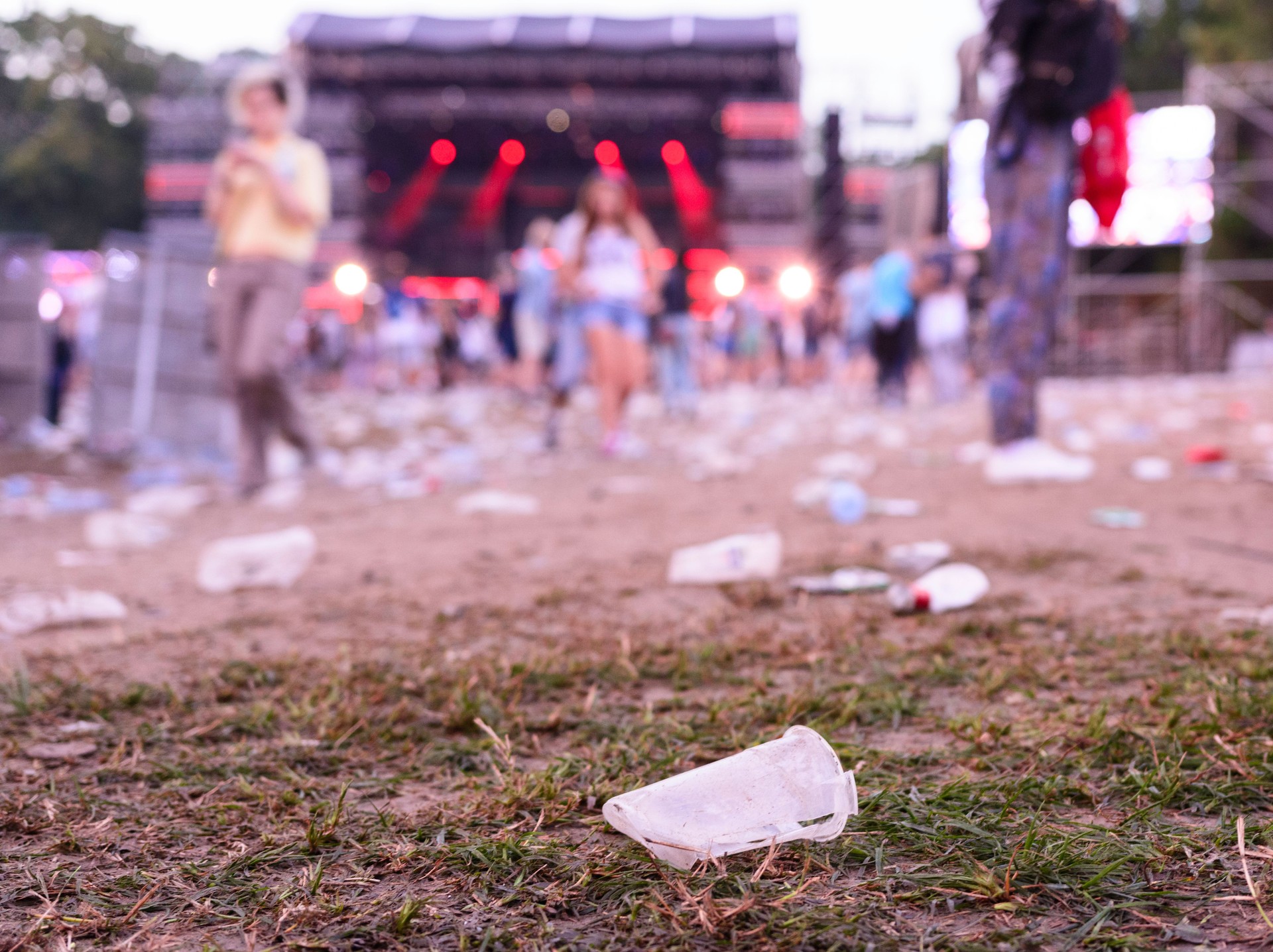 After party - empty glasses and garbage on the ground
