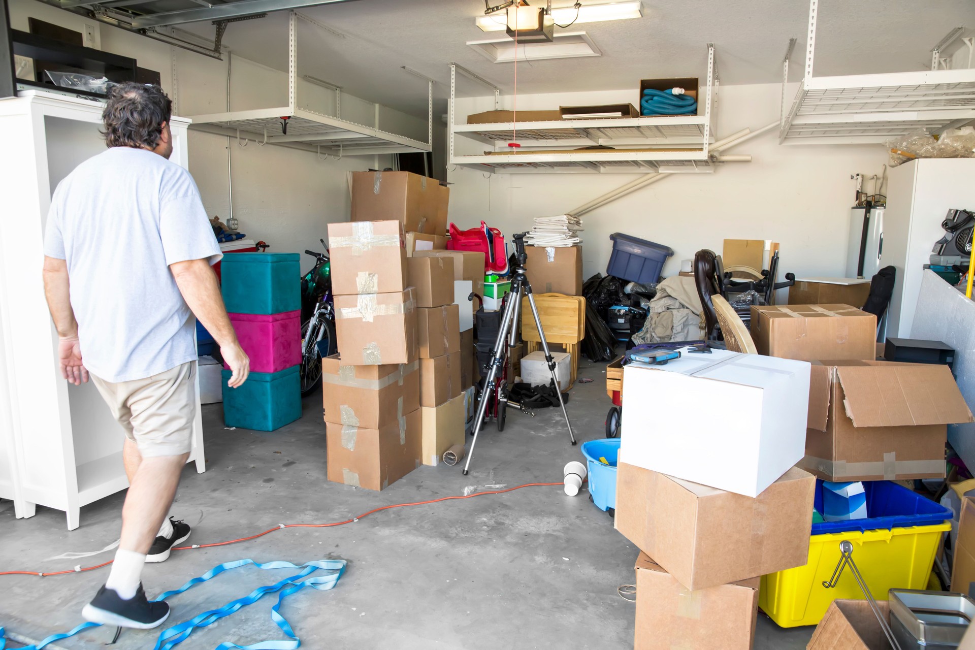 Moving Series: Mover in garage with items to be moved